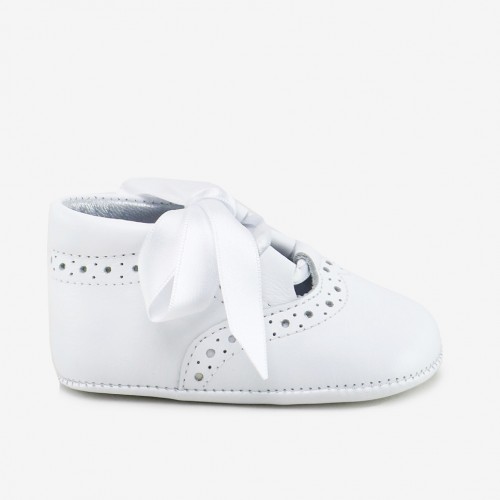 Soft white baby shoe