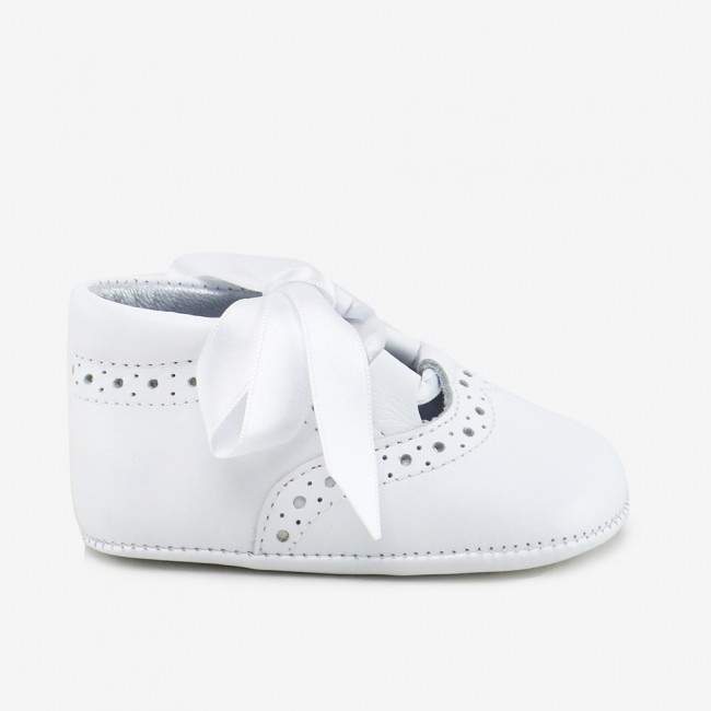 Soft white baby shoe