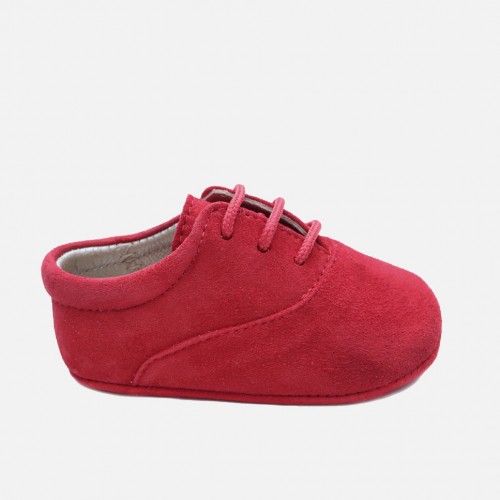 New born red derby shoe