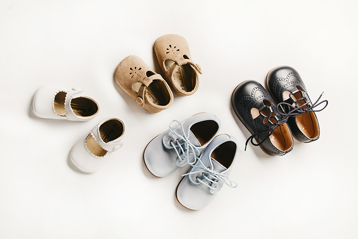 Comfortable and safe footwear for the first steps of boys and girls at home