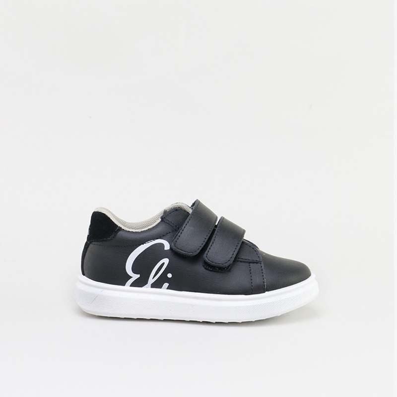 Sporty and resistant shoes with Velcro for going back to school