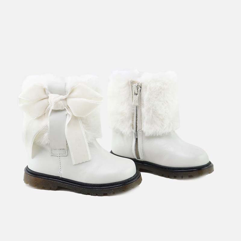 Shoe trends: ankle boots with sheepskin and fur, the stars of the season